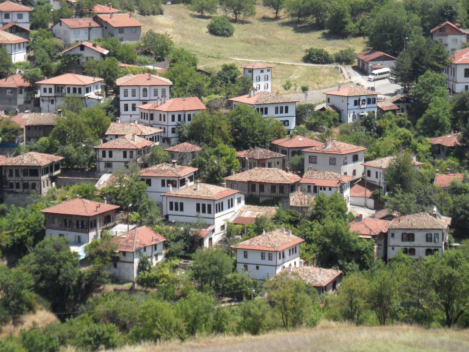 Safranbolu's white-fronted, tile-roofed Ottoman houses spread across the hillside.