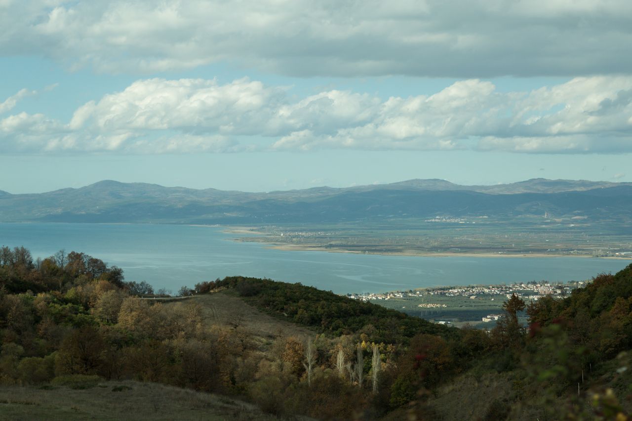 Lake İznik, its lakeside town and distant mountains seen from the surrounding hills.
