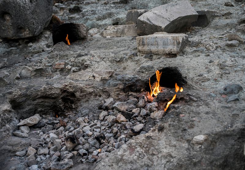Natural flames emerging between the rocks at Yanartaş near Çıralı.
