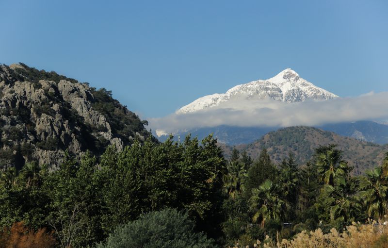 A wide view of Mount Tahtalı rising above Olympos Beach.